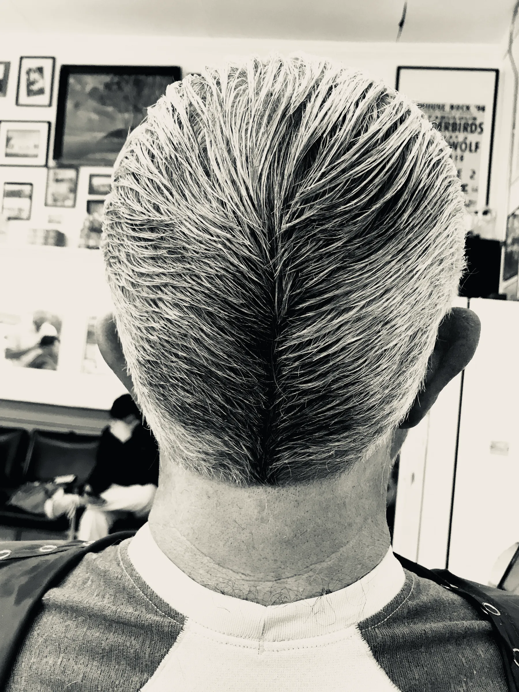 Precision haircut with a sharp neckline by Jake